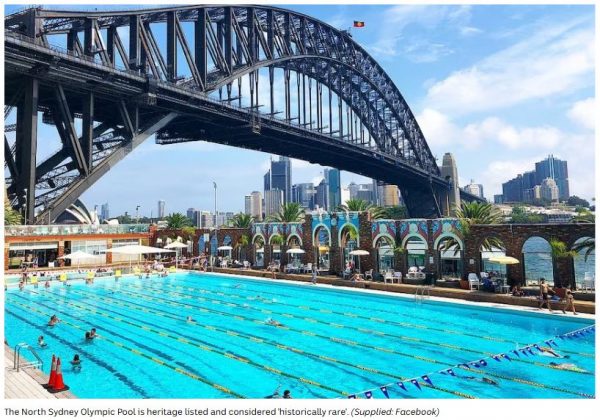 "North Sydney Olympic Pool with Harbour Bridge in the background, showcasing ongoing redevelopment progress."